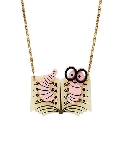 Necklace of a pink bookworm with big eyes reading an open book
