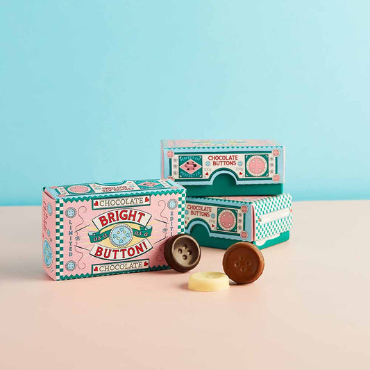 Bright as a Button chocolate buttons in pink and green boxes