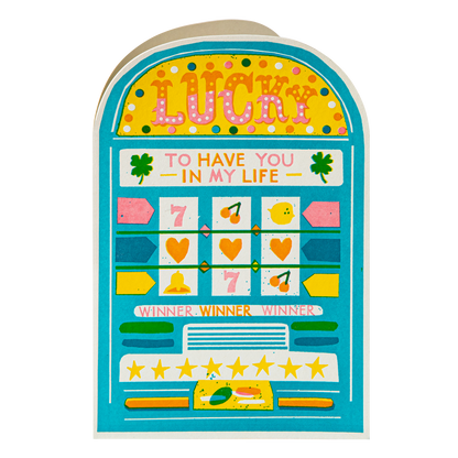 Lucky slot machine card standing up