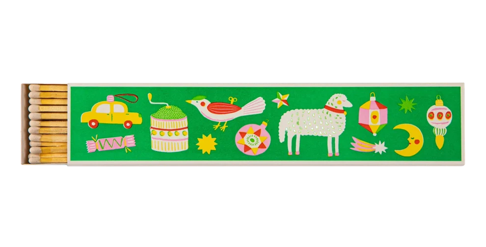 Archivist long matches in a green box decorated with Christmas ornaments, a sheep, a bird and a taxi