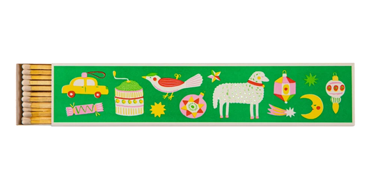 Archivist long matches in a green box decorated with Christmas ornaments, a sheep, a bird and a taxi