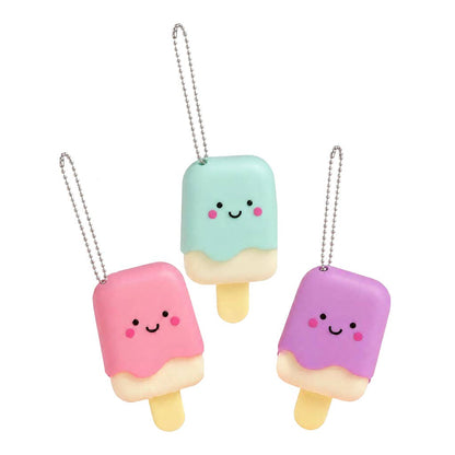 Three smiling ice pop lip gloss keychains