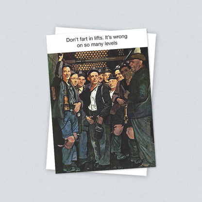 The Don't Fart in Lifts card with its white envelope