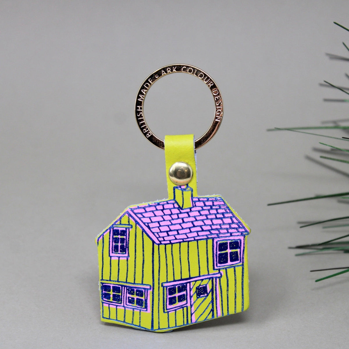Ark acid green leather cabin key ring with a purple roof