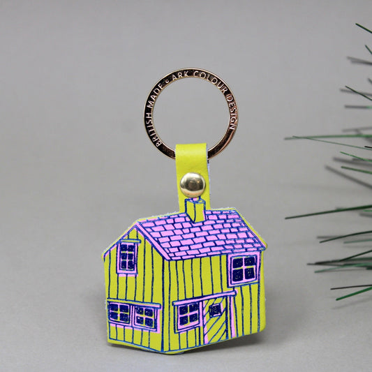 Ark acid green leather cabin key ring with a purple roof