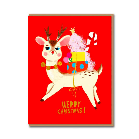 1973 card: a reindeer carrying presents and a Christmas tree, with 'Merry Christmas!' on red