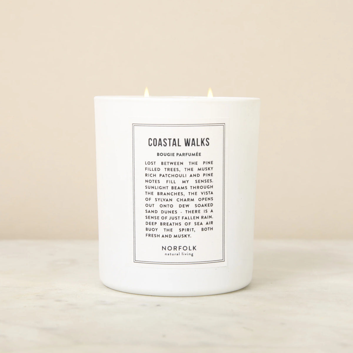Norfolk Natural Living Coastal Walks soy candle in a white vessel with a printed label