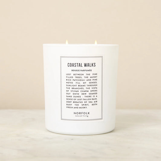 Norfolk Natural Living Coastal Walks soy candle in a white vessel with a printed label