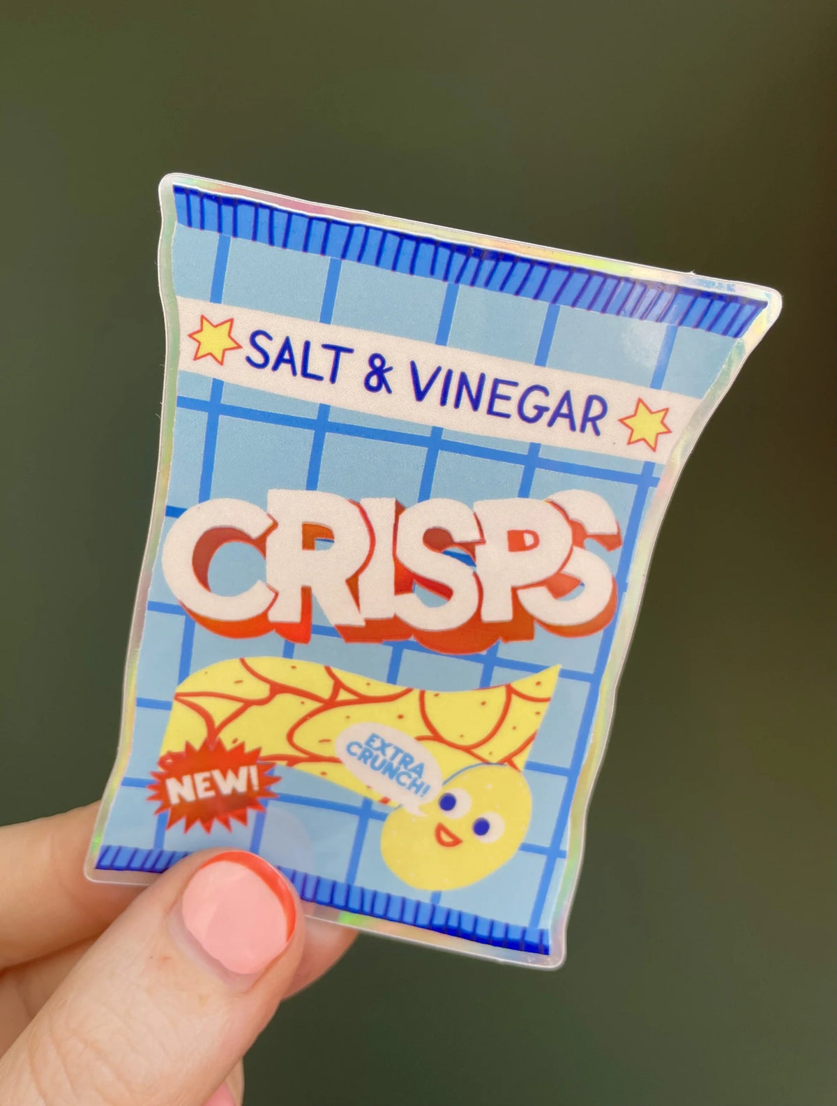 Naomi Wilkinson sticker of a packet of salt & vinegar crisps with a smiling crisp, held in a hand