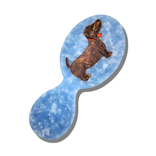 Solar Eclipse hand-painted hairbrush in sky blue with a dachshund
