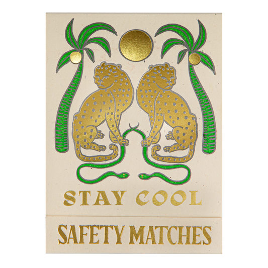 Match book cover: two gold leopards under palm trees: Stay cool, safety matches