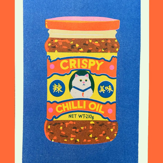 Naomi Wilkinson A4 riso print: a jar of crispy chilli oil with a cat on the label, on blue