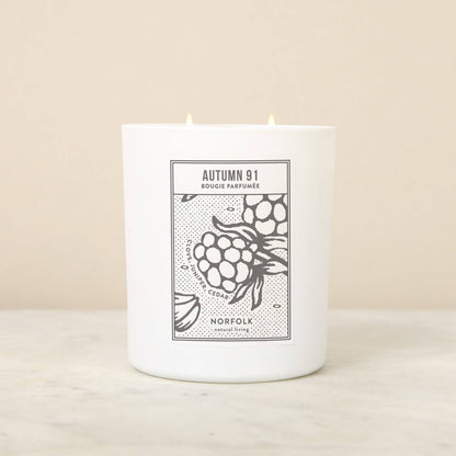 White Norfolk Autumn 91 candle with a blackberry illustration