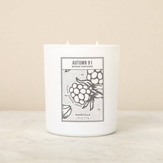 White Norfolk Autumn 91 candle with a blackberry illustration
