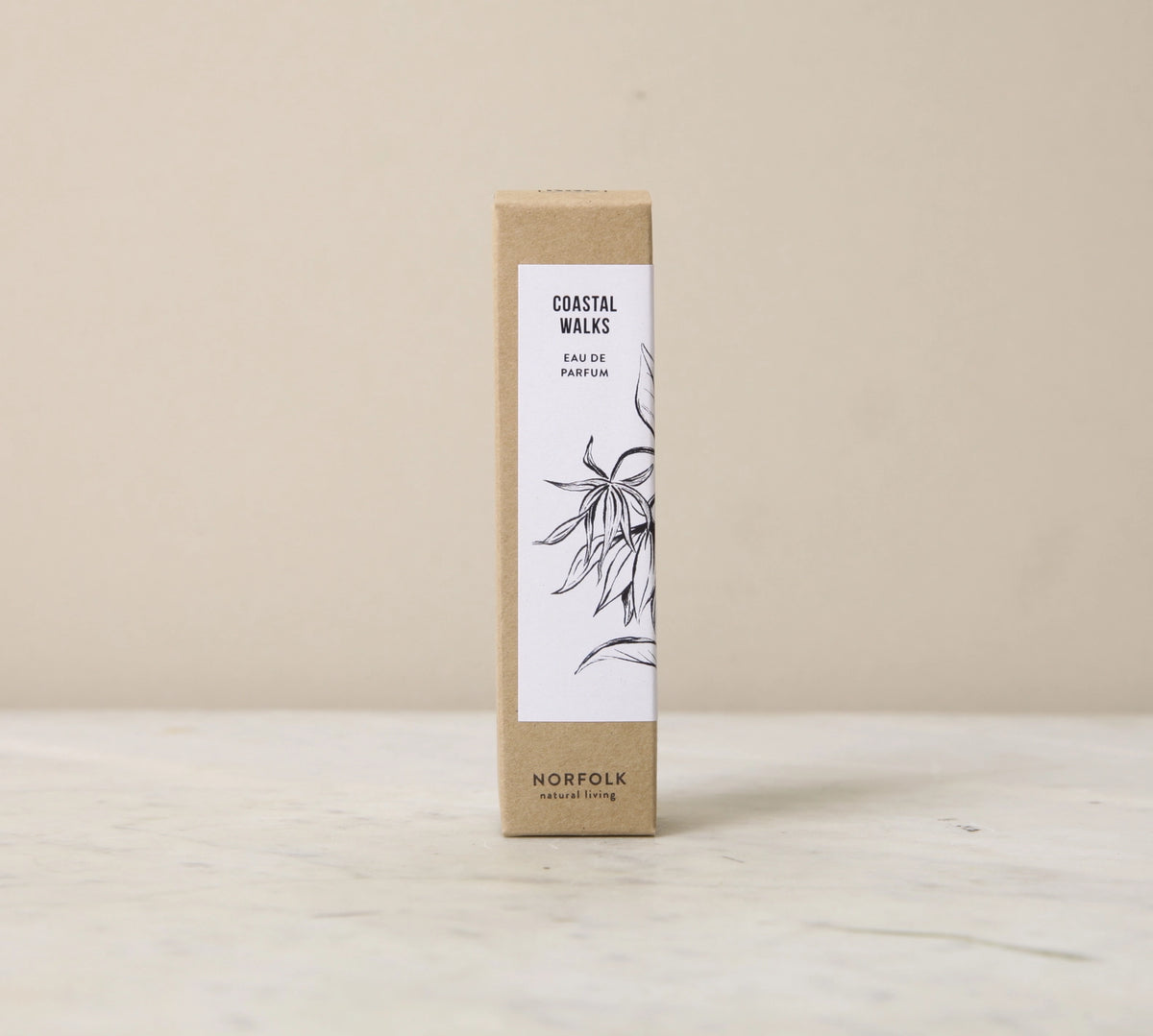 Coastal Walks eau de parfum box: a tall kraft box with a white botanical label