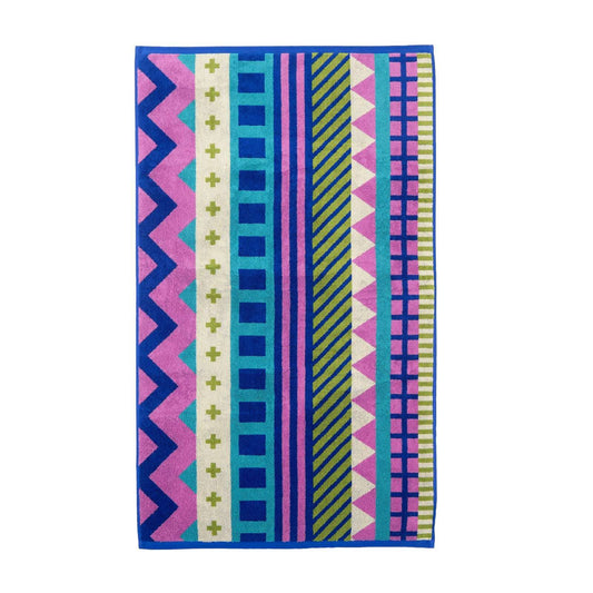 Donna Wilson Circus bath towel with pink, blue and green zigzags, crosses and stripes