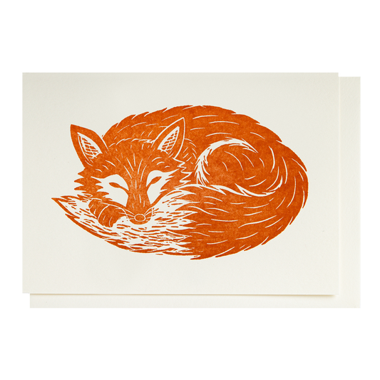 Card with an orange fox curled up asleep
