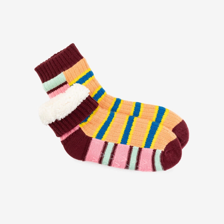 Zipper Stripe house socks folded to show the fluffy white lining
