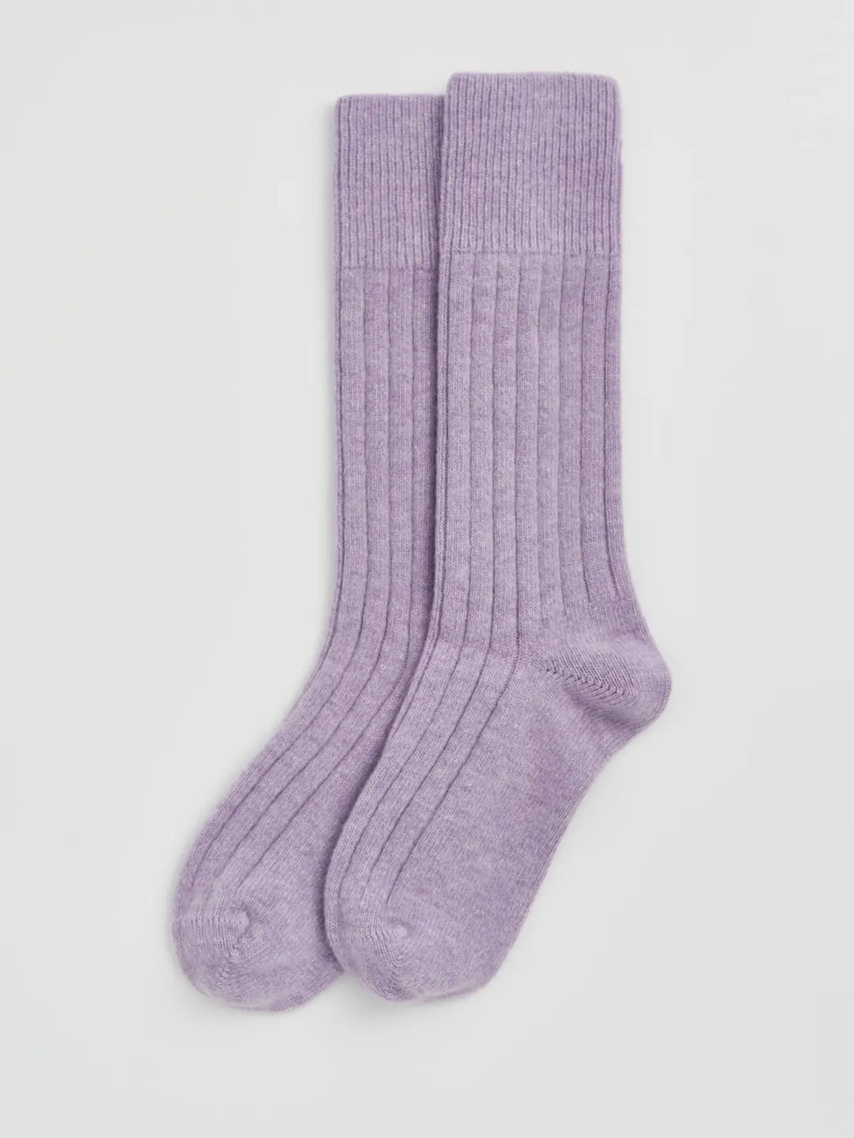 Pair of parma violet ribbed bed socks laid flat