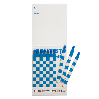 Inside the Greatest Of All Time match book with blue and white matches and a To/From space