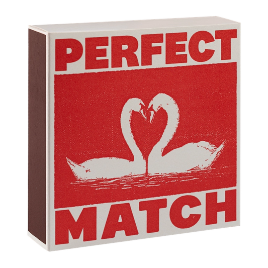 Archivist Perfect Match matches: two white swans forming a heart on red