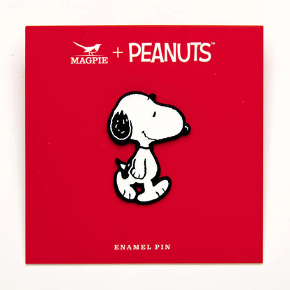 Snoopy enamel pin on its red Magpie x Peanuts card