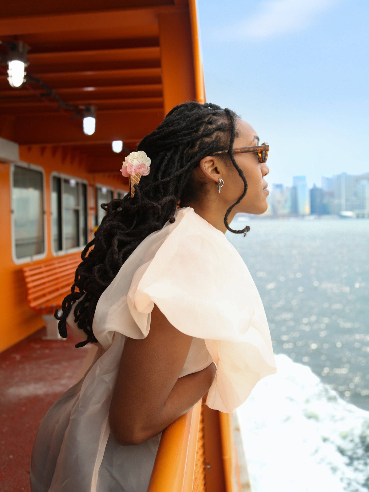 Woman on a ferry wearing the gelato clip