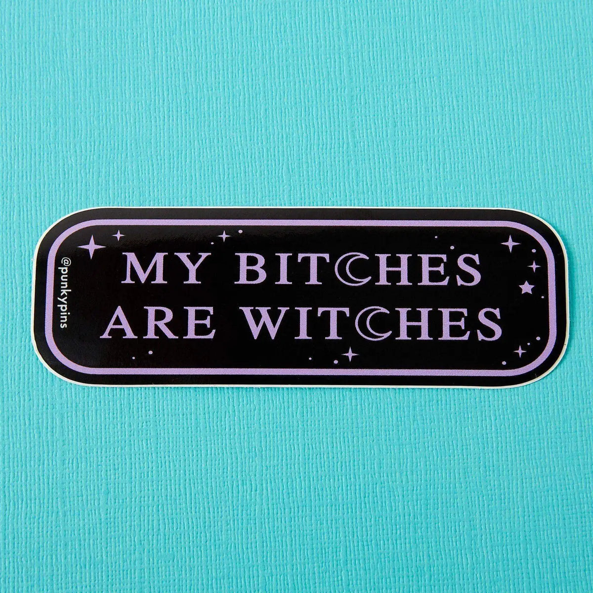 Punky Pins sticker in black and lilac reading 'My bitches are witches'