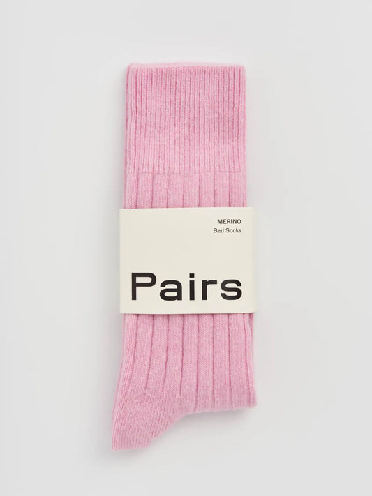 Pairs merino bed socks in sugar pink, ribbed, with a Pairs paper band