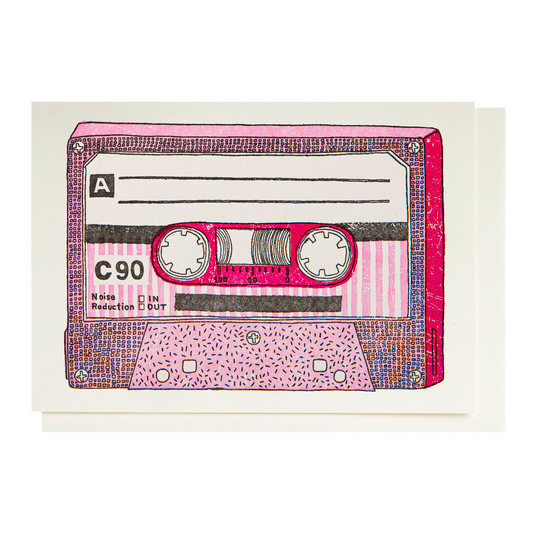 Card with a pink C90 cassette tape