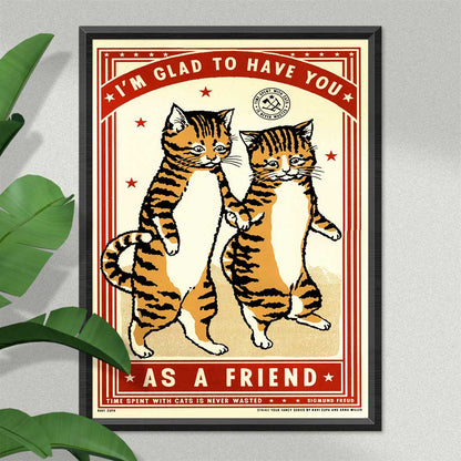 Friend print in a black frame beside a plant