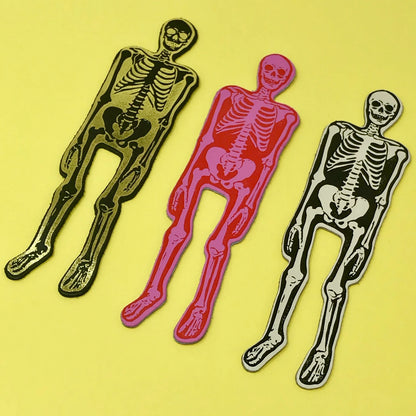Ark skeleton bookmarks in black and gold, pink and white