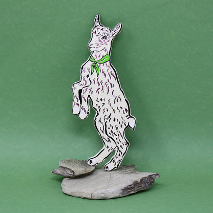 Ark cream goat bookmark with a green neckerchief, standing on a rock
