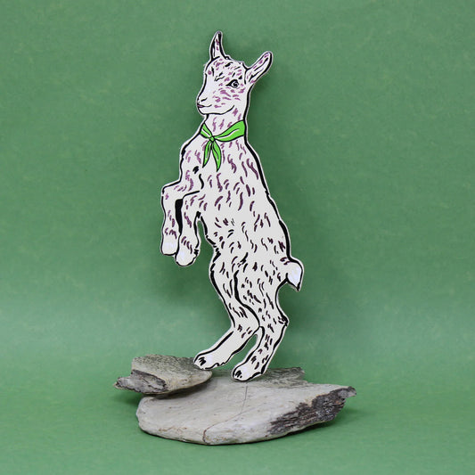 Ark cream goat bookmark with a green neckerchief, standing on a rock