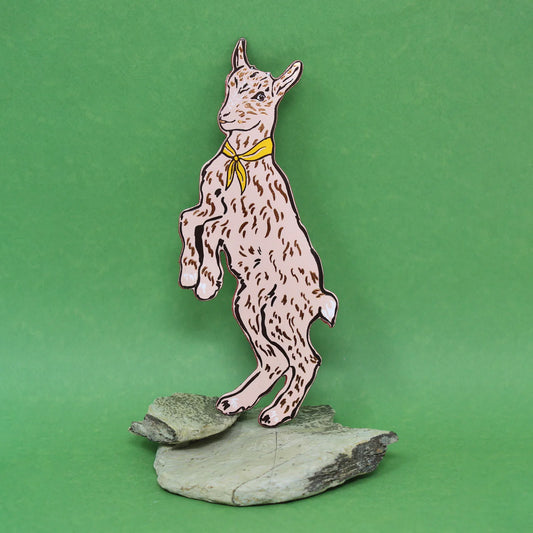Ark pale pink goat bookmark with a yellow neckerchief, standing on a rock