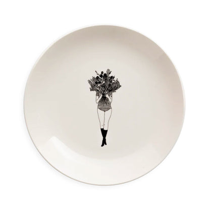 Helen B white plate with a line drawing of a girl holding a bunch of flowers
