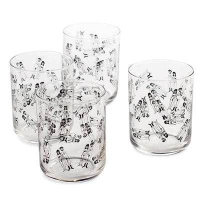 Four Helen B glass tumblers printed with a pattern of naked couples