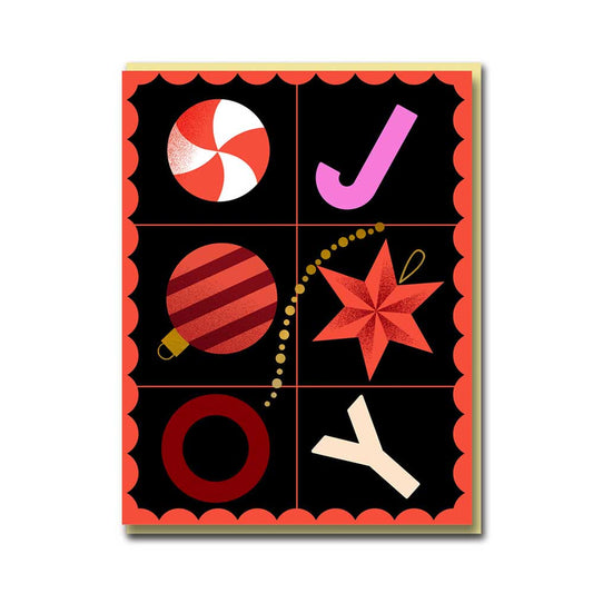 Christmas card with a grid of baubles, a candy cane and a star spelling JOY