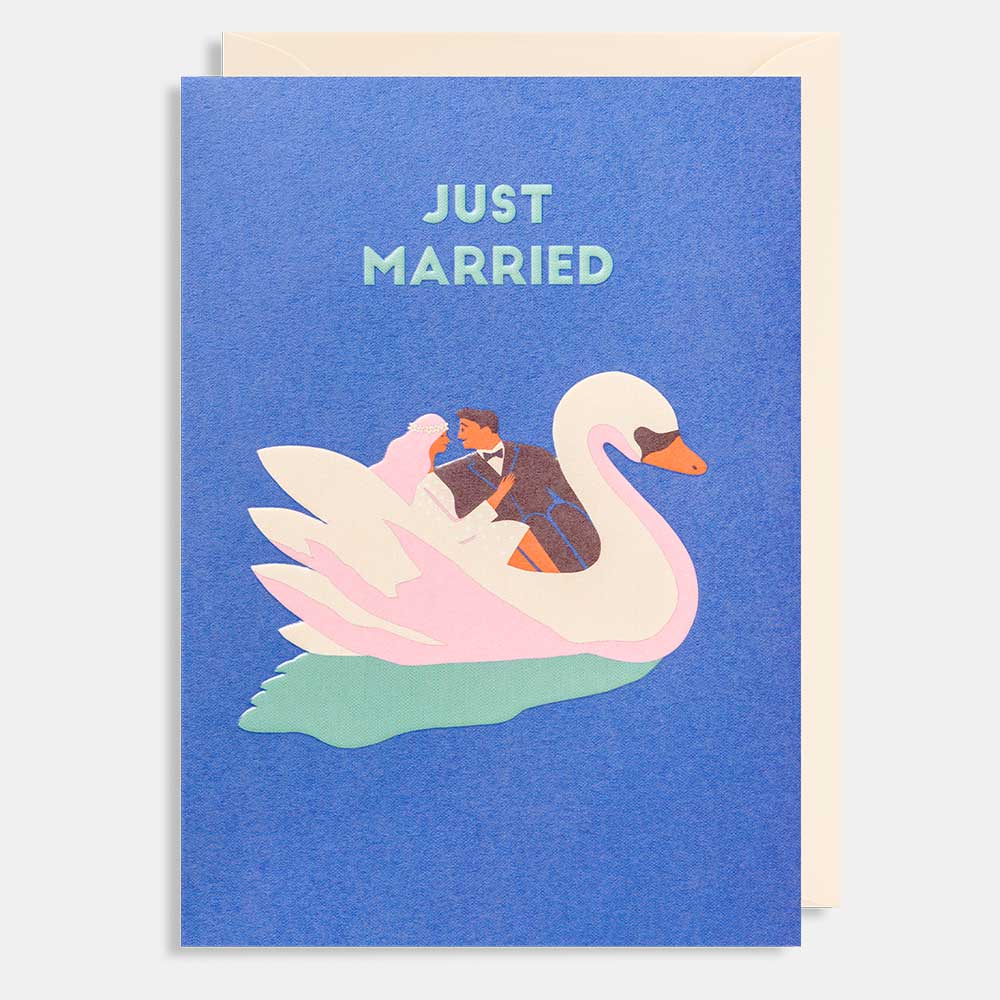 Lagom card: a couple riding a white swan boat on blue, with 'Just married'