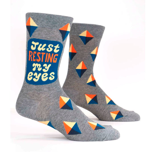 Blue Q men's socks: grey with diamond shapes and 'Just resting my eyes', on leg forms