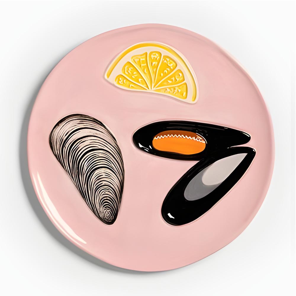 Close-up of the pink mussel and lemon plate