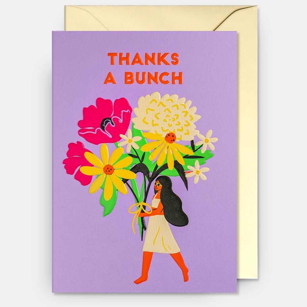 Lagom card: a girl carrying a huge bunch of flowers on lilac, with 'Thanks a bunch'
