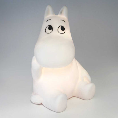 White sitting Moomintroll LED lamp, glowing softly