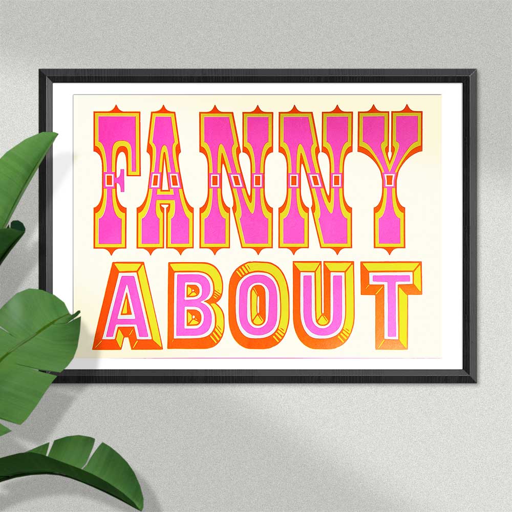 Mandy Doubt risograph print in a black frame: 'Fanny about' in pink circus lettering