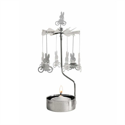 Silver Miffy angel chime with Miffy on bikes over a tealight