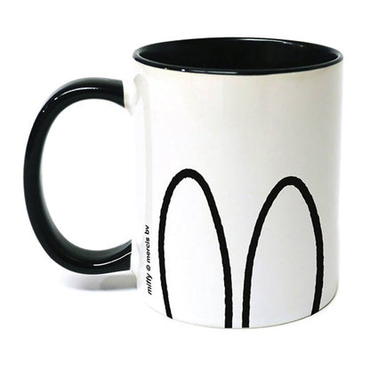 White Miffy mug with black handle and Miffy's ears drawn on the side