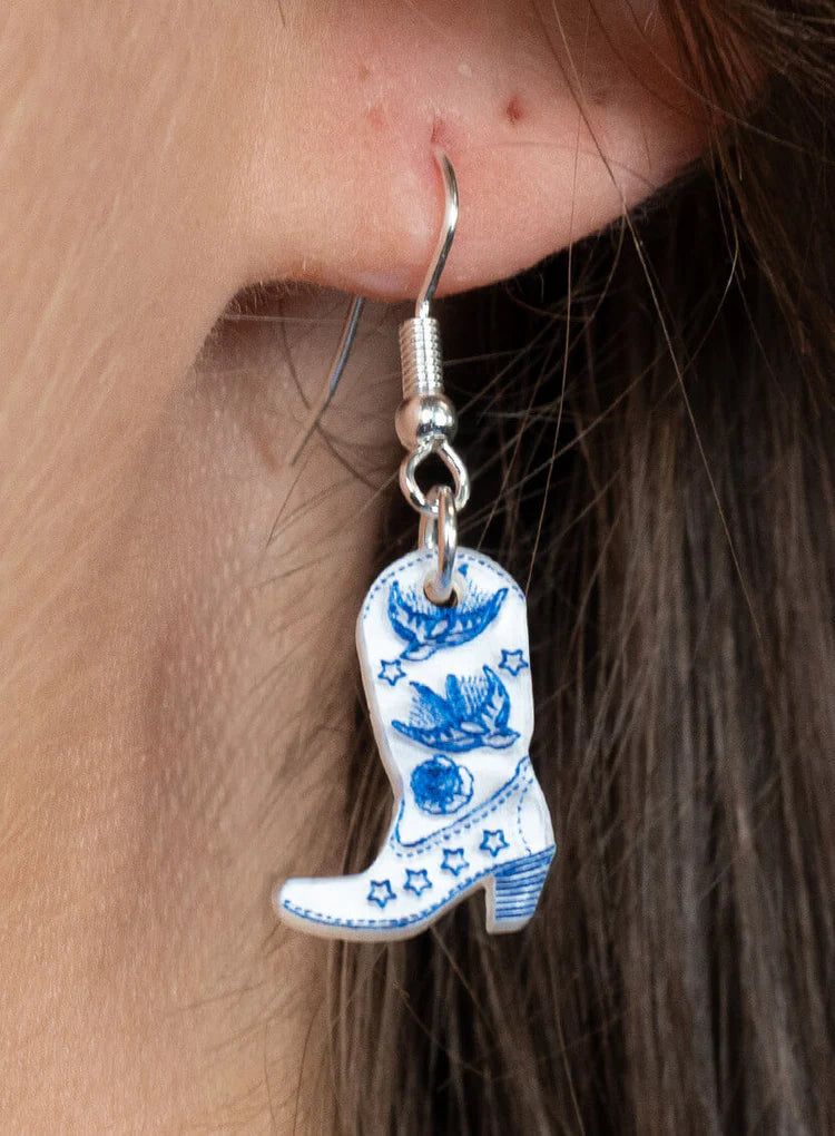 Cowboy boot earring worn