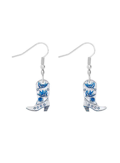 Tatty Devine cowboy boot earrings in white with blue swallows and flowers