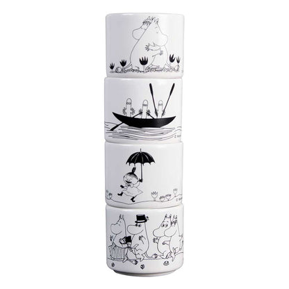 Four Moomin family egg cups stacked