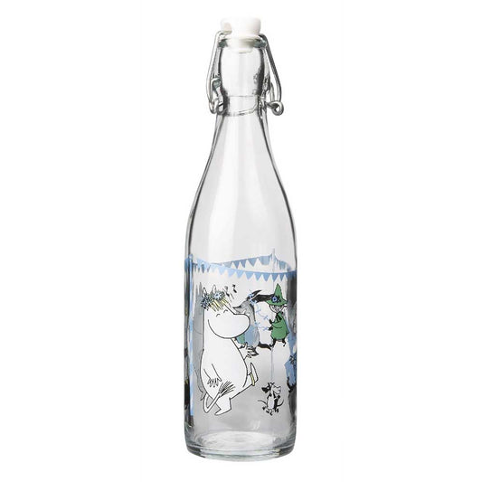 Clear glass swing-top bottle printed with Moomins at a summer party